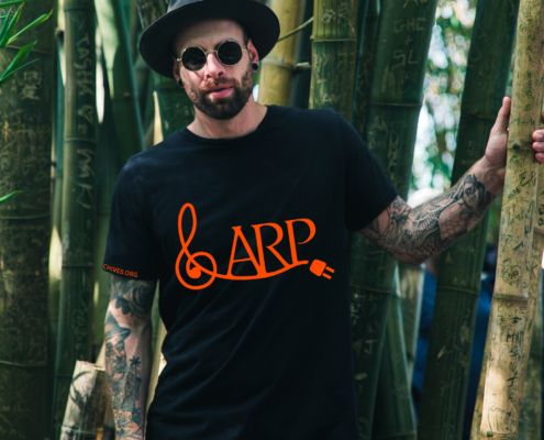 man wearing ARP vintage style tee in bamboo forest